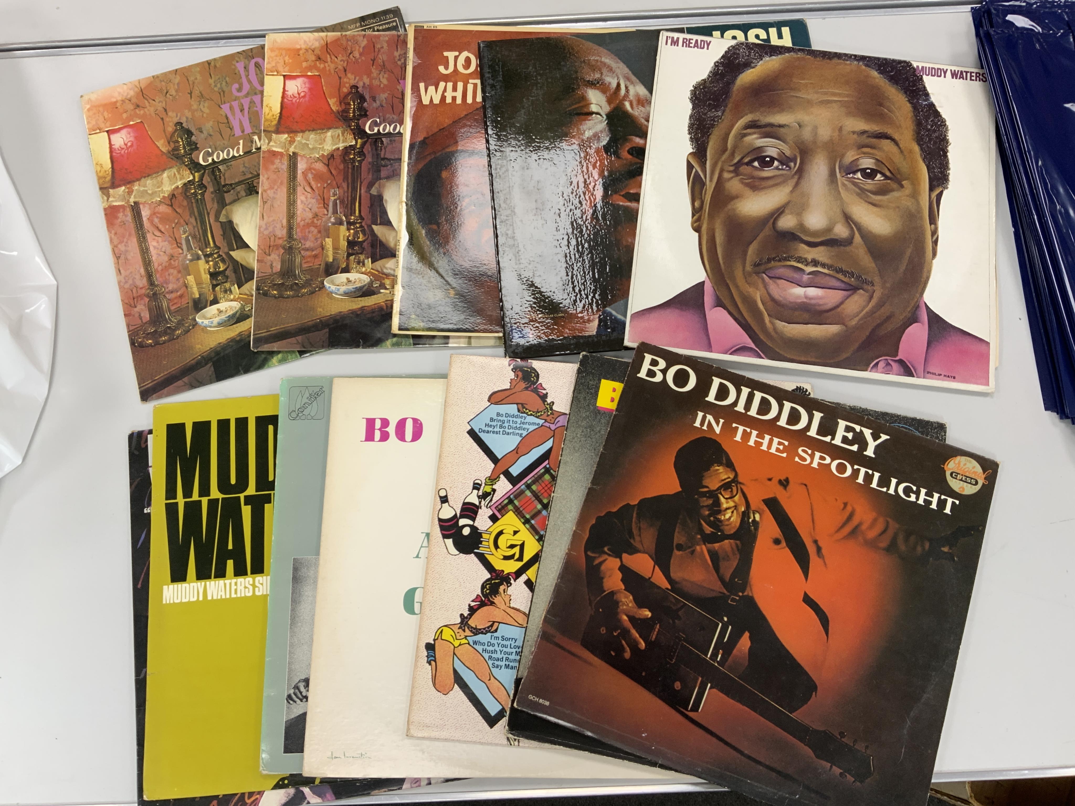 Thirty-six blues and jazz LP record albums on EMI, Chess, CBS, Parlophone, etc. Artists including; Bo Diddley, Muddy Waters, Josh White, John Lee Hooker, etc. including some compilation albums. Condition - fair to good